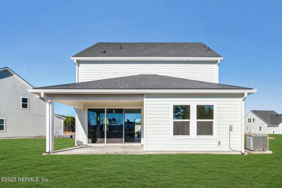 Exterior details and patio area of a home in Evergreen Island at Silverleaf - Classic, St. Augustine (Image 3).