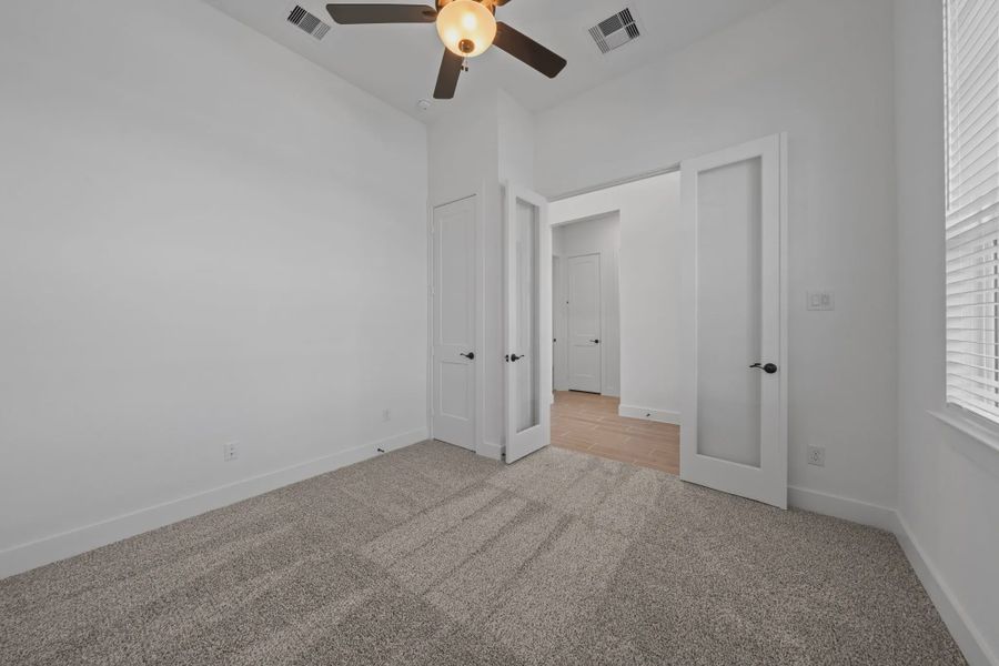 Representative unfurnished interior of a home built from the Augusta by Chesmar Homes in Riceland Alley Loads, Mont Belvieu (Image 21).