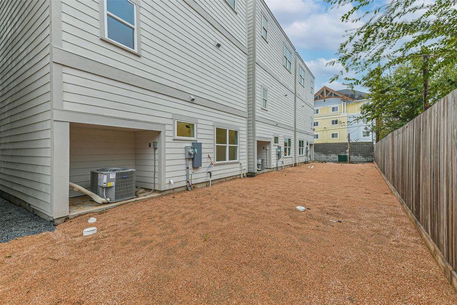 Exterior details and patio area of a home in , Houston (Image 3).