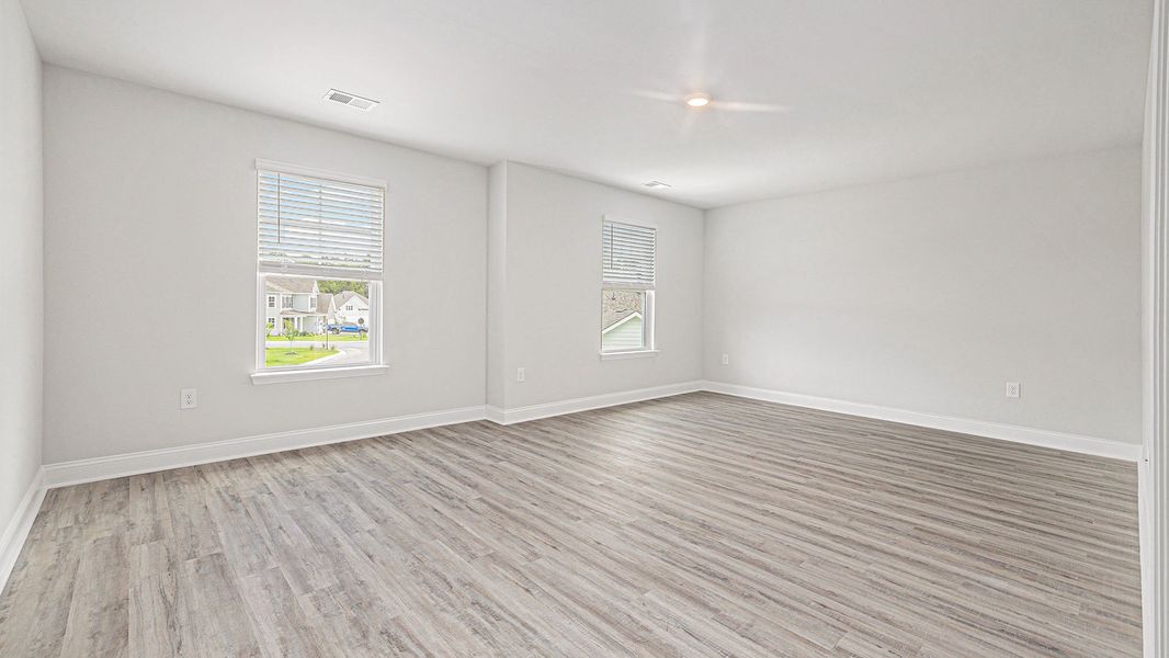 Spacious, unfurnished interior of a new home in Chapman Village, Conway (Image 19).