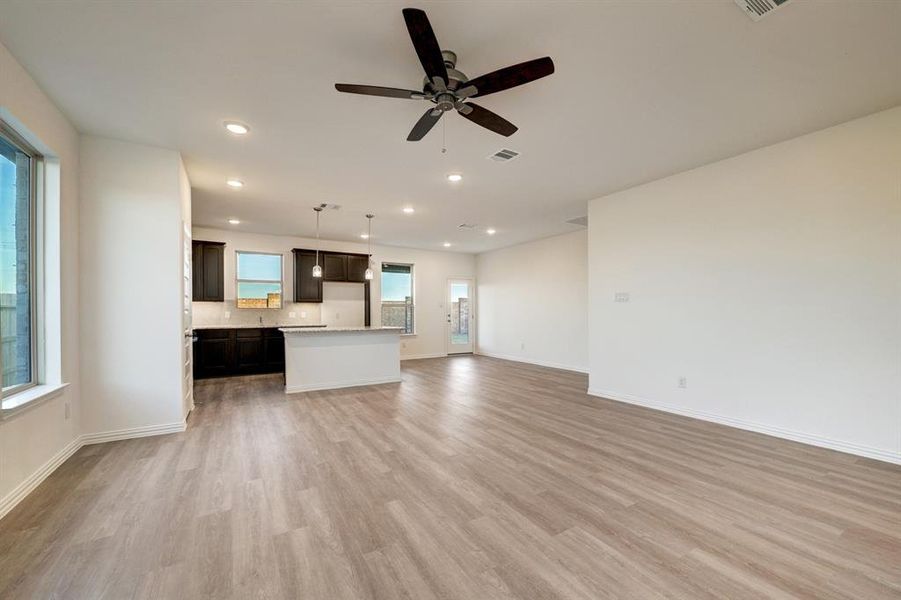 Example of view from family room to kitchen Example of view from family room to kitchen