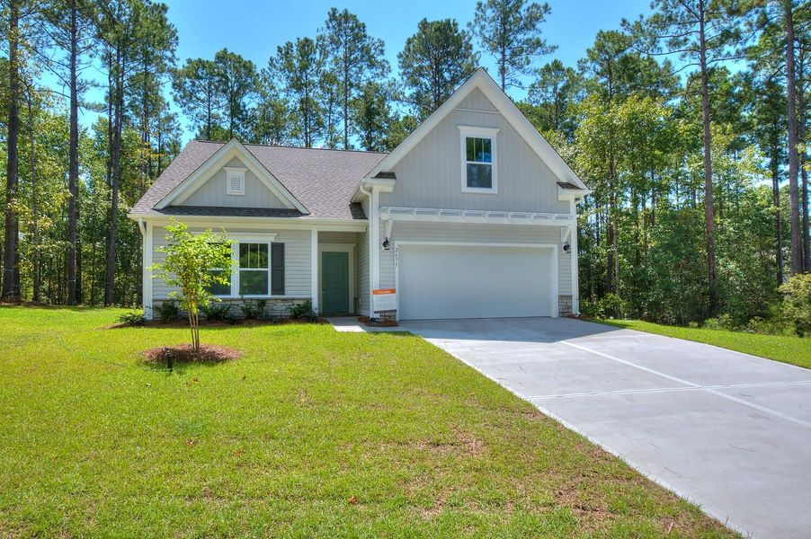 Representative exterior photo of a completed home built from the Durell by True Homes in Homecoming, Ravenel, SC (Image 14).