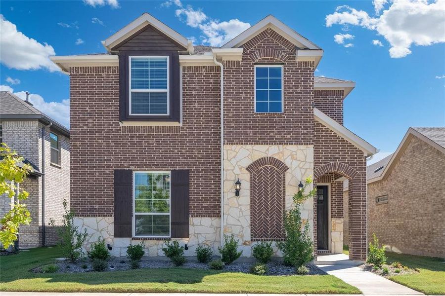 Front exterior of a new home in , Garland, TX, highlighting curb appeal (Image 16).