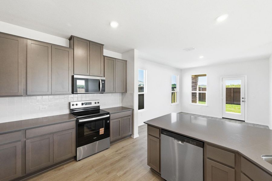Furnished interior view inside a new home in Stoney Chase, Del Valle (Image 13).
