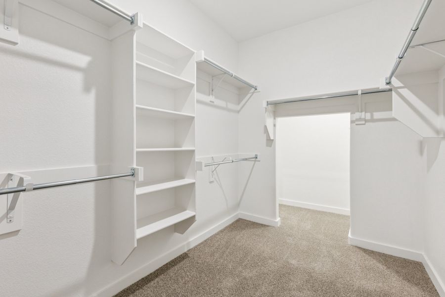 Primary Closet in the Stanley II home plan by Trophy Signature Homes – REPRESENTATIVE PHOTO