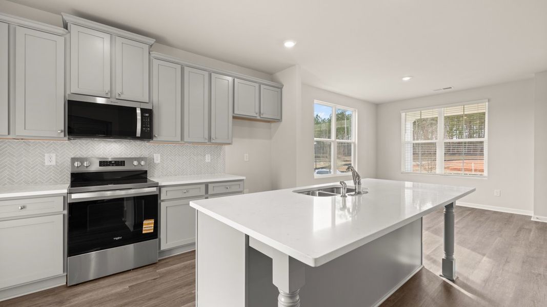 Representative furnished interior of a home built from the Ashmore by D.R. Horton in Brookland Commons, Monroe (Image 8).