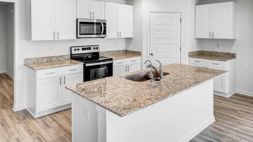 Representative furnished interior of a home built from the Lismore by D.R. Horton in Ashton Park Phase III, Freeport (Image 6).