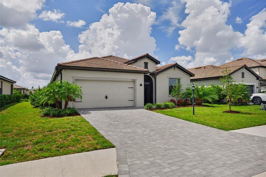 Front exterior of a new home in , Bradenton, FL, highlighting curb appeal (Image 29). Front exterior of a new home in , Bradenton, FL, highlighting curb appeal (Image 29).