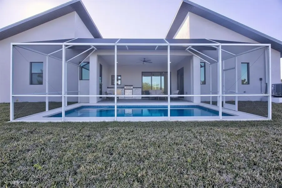 Exterior details and patio area of a home in , Port Charlotte (Image 4). Exterior details and patio area of a home in , Port Charlotte (Image 4).