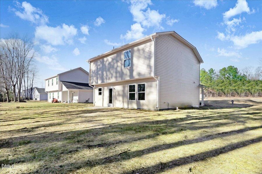 36-Side and rear view of new constructio