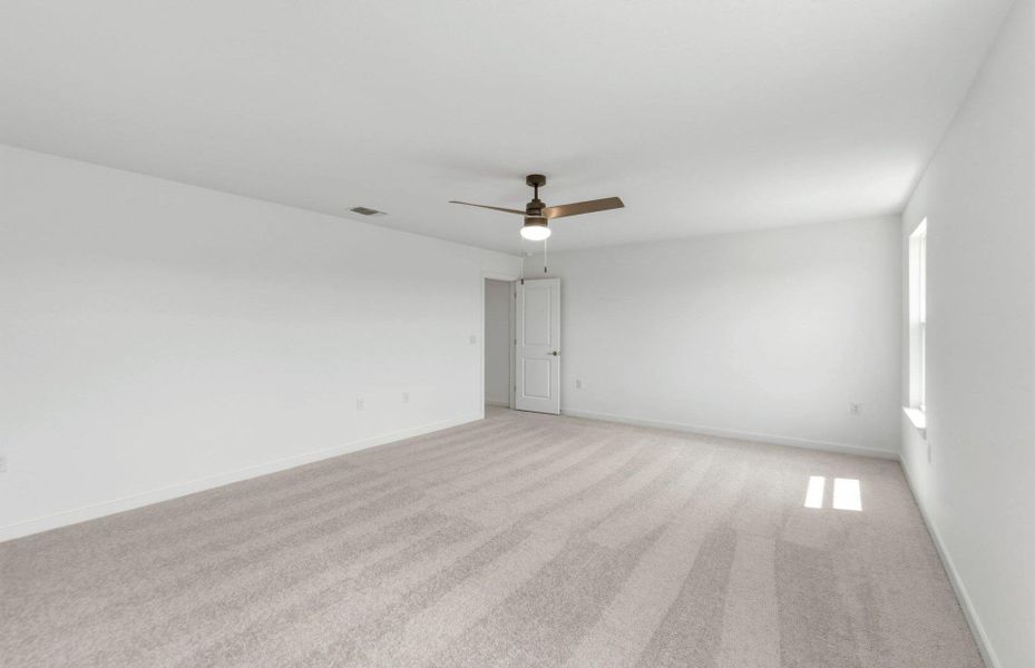 Spacious, unfurnished interior of a new home in Cameron Place, Manor (Image 24).