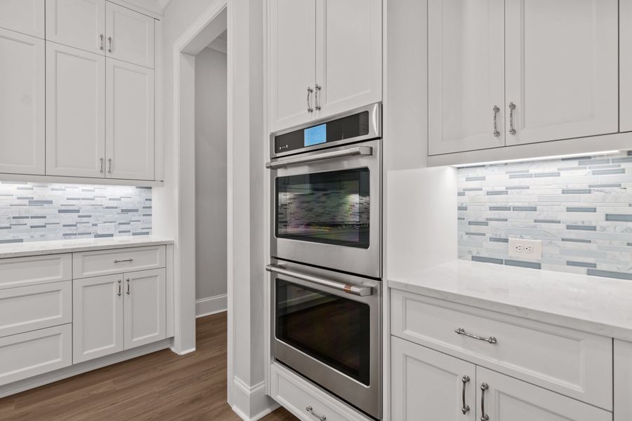 Representative furnished interior of a home built from the The Danville by The Providence Group in Bellwyn, Alpharetta (Image 13).