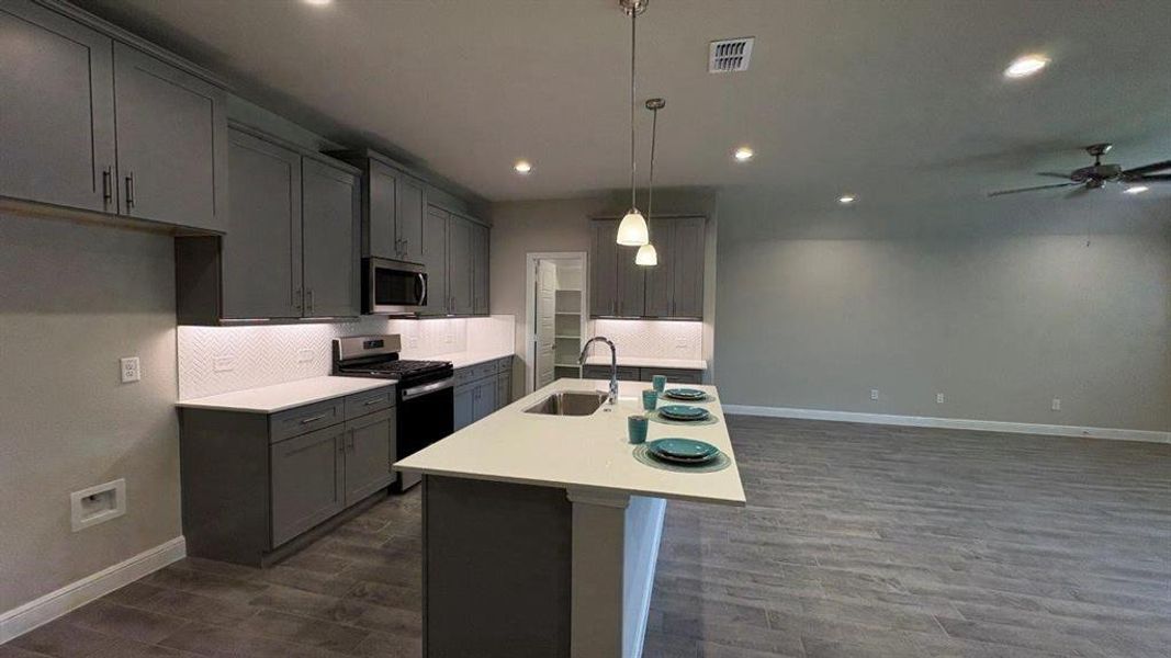 Kitchen - All Home and community information, including pricing, included features, terms, availability and amenities, are subject to change at any time without notice or obligation. All Drawings, pictures, photographs, video, square footages, floor plans, elevations, features, colors and sizes are approximate for illustration purposes only and will vary from the homes as built.