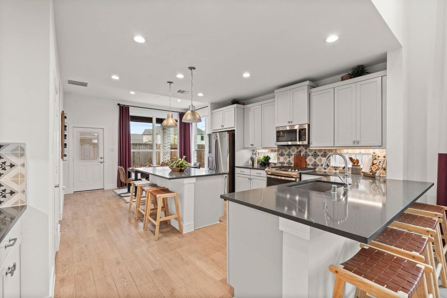 Furnished interior view inside a new home in Sunterra, Katy (Image 4).