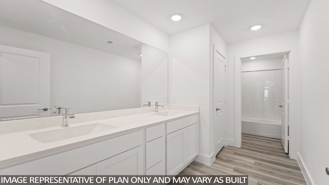 Representative furnished interior of a home built from the E60F by D.R. Horton in Riverside Estates, Mont Belvieu (Image 9).