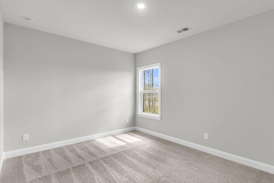 Spacious, unfurnished interior of a new home in Tidewater at Lakes of Cane Bay, Summerville (Image 13). Spacious, unfurnished interior of a new home in Tidewater at Lakes of Cane Bay, Summerville (Image 13).