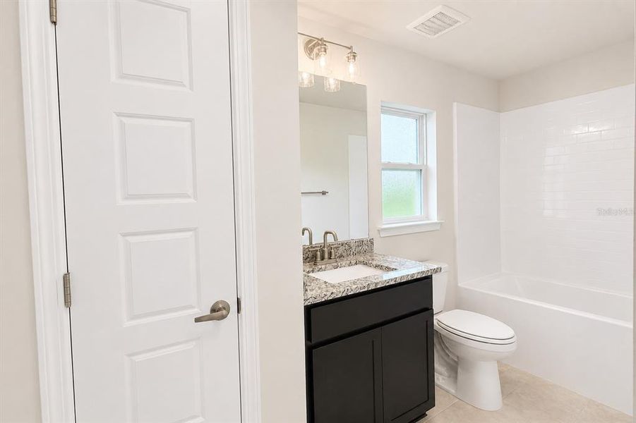 Furnished interior view inside a new home in Harmony Central, St. Cloud (Image 7).
