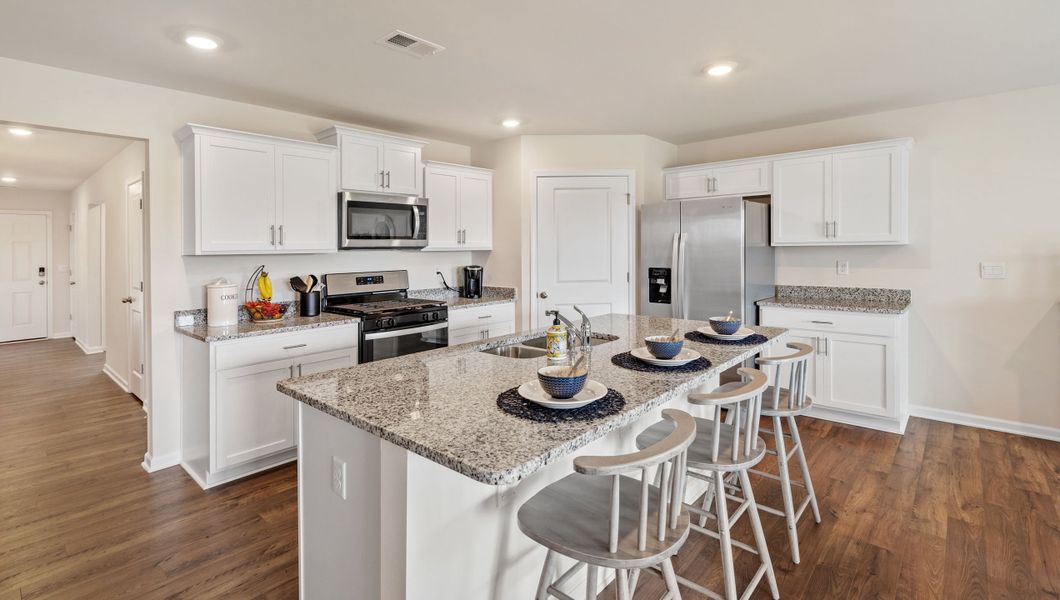 Representative furnished interior of a home built from the Cali by D.R. Horton in Lakestone, Woodruff (Image 8).