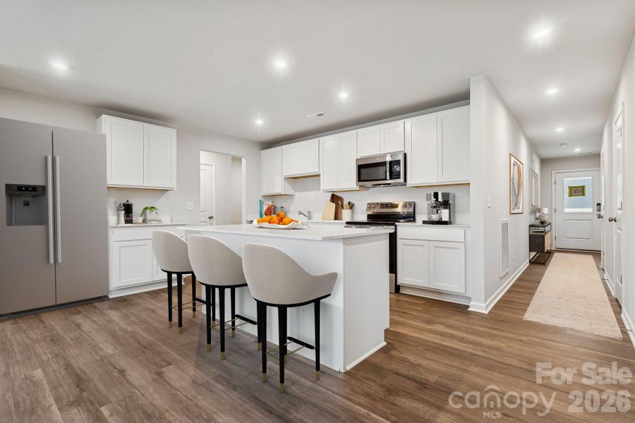 Example Photo Example Photo