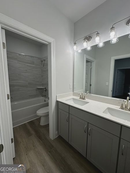 Furnished interior view inside a new home in Mirror Lake at South Harbour, Villa Rica (Image 5).