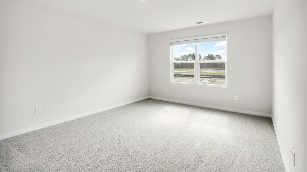 Spacious, unfurnished interior of a new home in Lockwood Landing, Supply (Image 25).