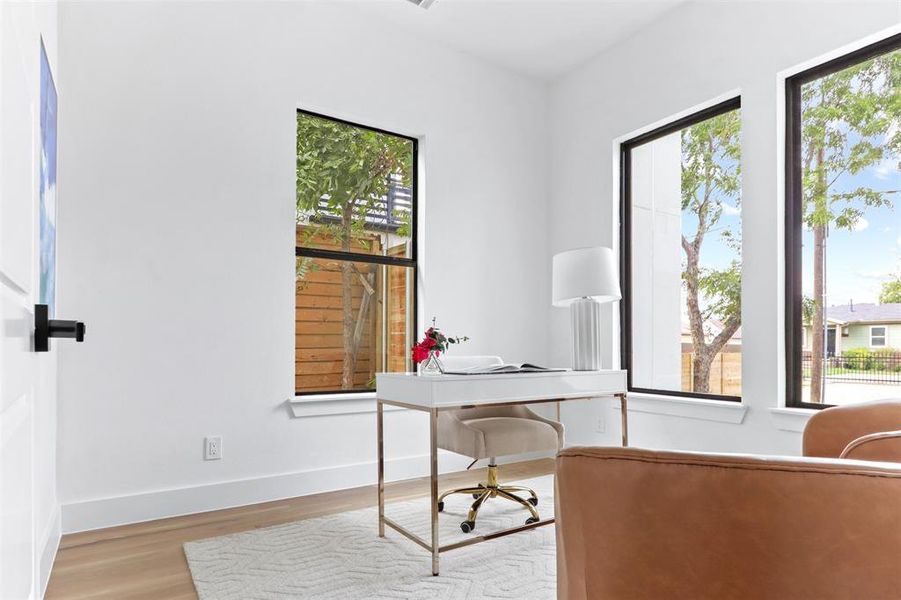 Office featuring hardwood / wood-style floors