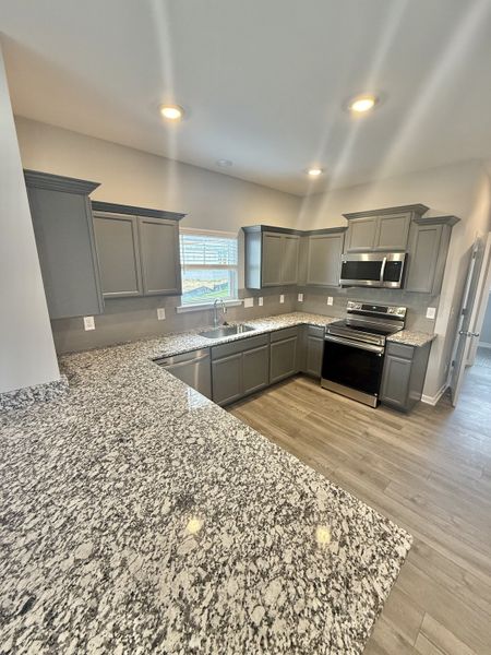 Furnished interior in a model home at Stone Fort Meadows in Manchester (Image 5).