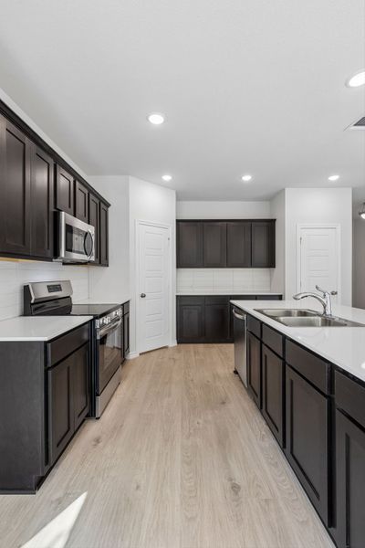 Furnished interior view inside a new home in Eagle Cove, Denton (Image 13).