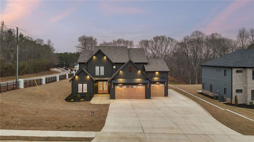 Front exterior of a new home in , Auburn, GA, highlighting curb appeal (Image 36).