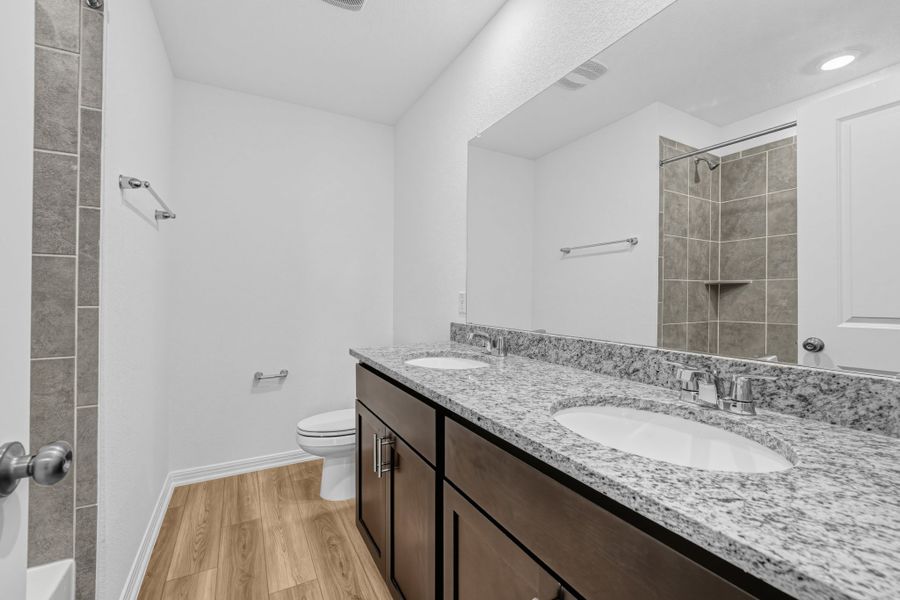 Furnished interior view inside a new home in Sunfield, Buda (Image 9).
