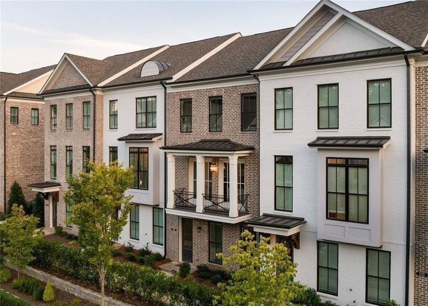 Front exterior of a new home in Towns on Thompson, Alpharetta, GA, highlighting curb appeal (Image 1).