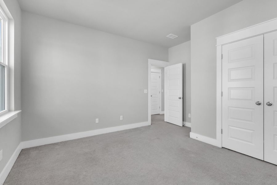 Spacious, unfurnished interior of a new home in Carnes Crossroads: Coastal Collection, Summerville (Image 25).