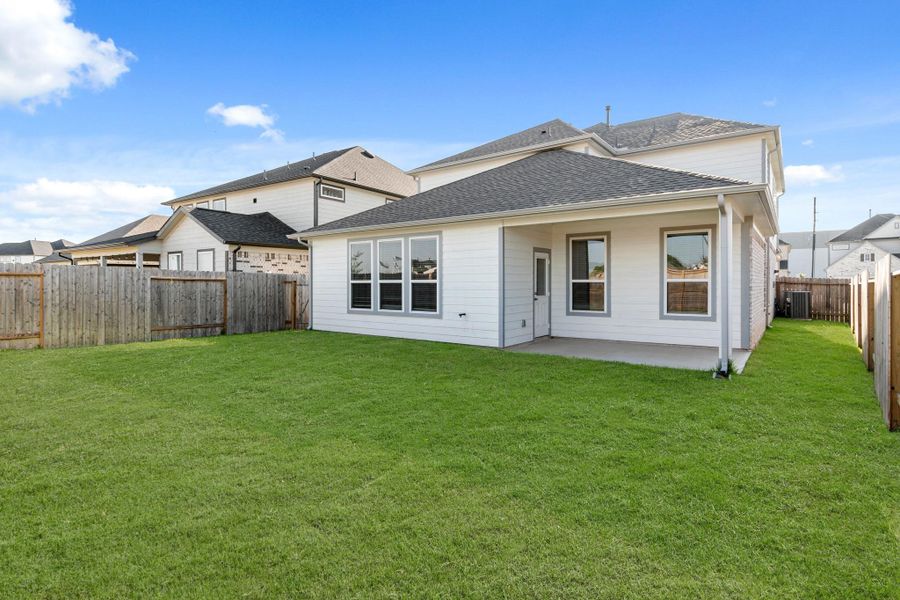 Front exterior of a new home in Morton Creek Ranch, Katy, TX, highlighting curb appeal (Image 17).