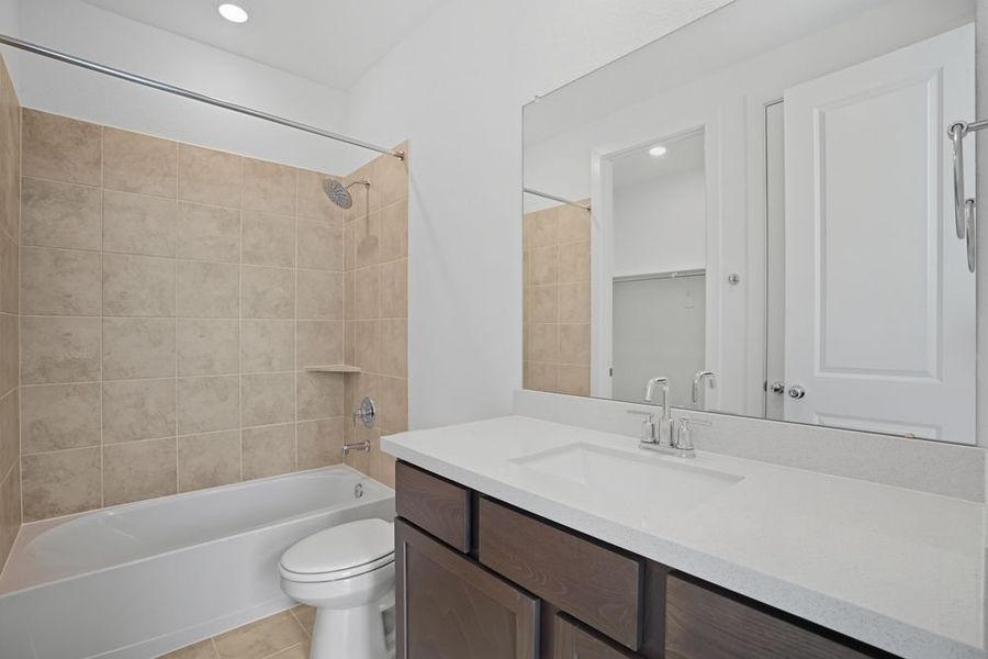 Furnished interior view inside a new home in Avalon at Cypress, Cypress (Image 8).