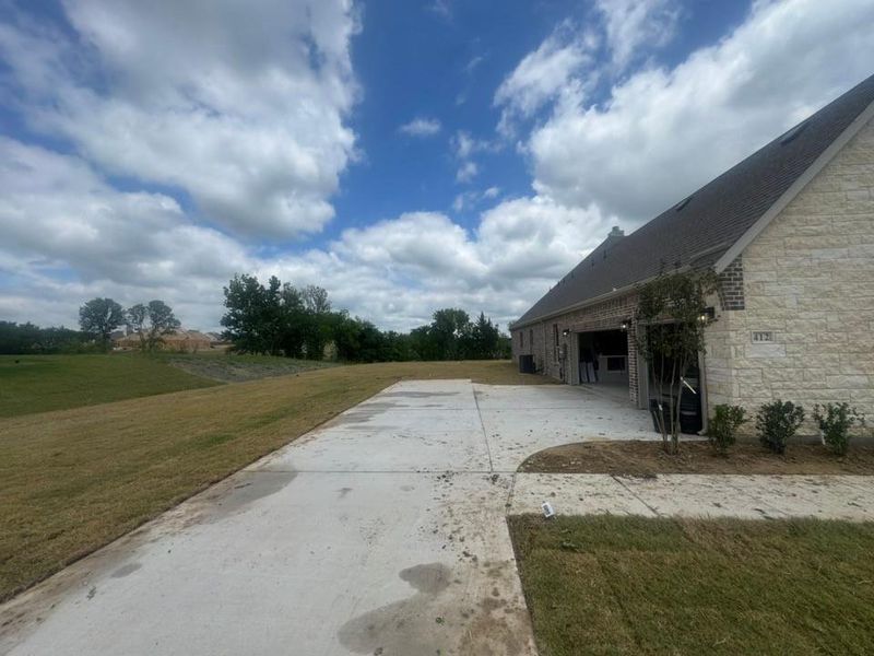 Exterior details and patio area of a home in Creekview Addition, Van Alstyne (Image 3).