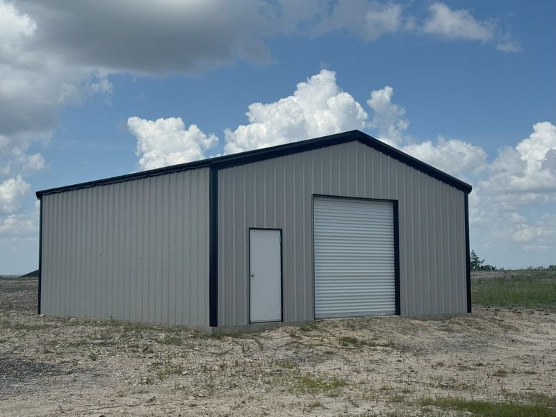 Front exterior of a new home in Rocky Top Ranch, Reno, TX, highlighting curb appeal (Image 33). Front exterior of a new home in Rocky Top Ranch, Reno, TX, highlighting curb appeal (Image 33).