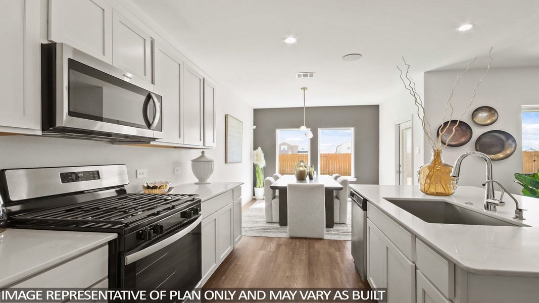 Representative furnished interior of a home built from the E40N (Horton-e) by D.R. Horton in Sunterra, Katy (Image 15).