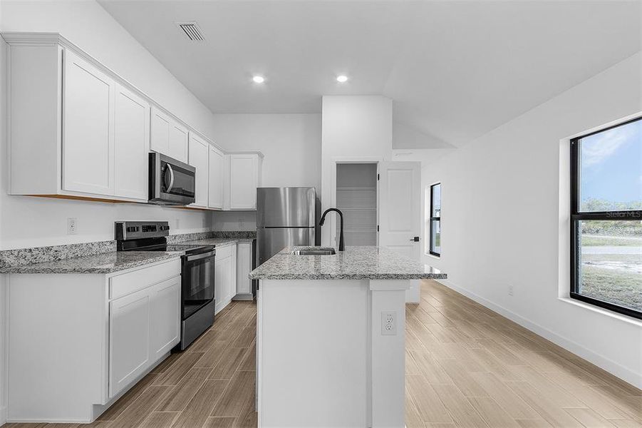 Furnished interior view inside a new home in Port Charlotte, North Port (Image 4).
