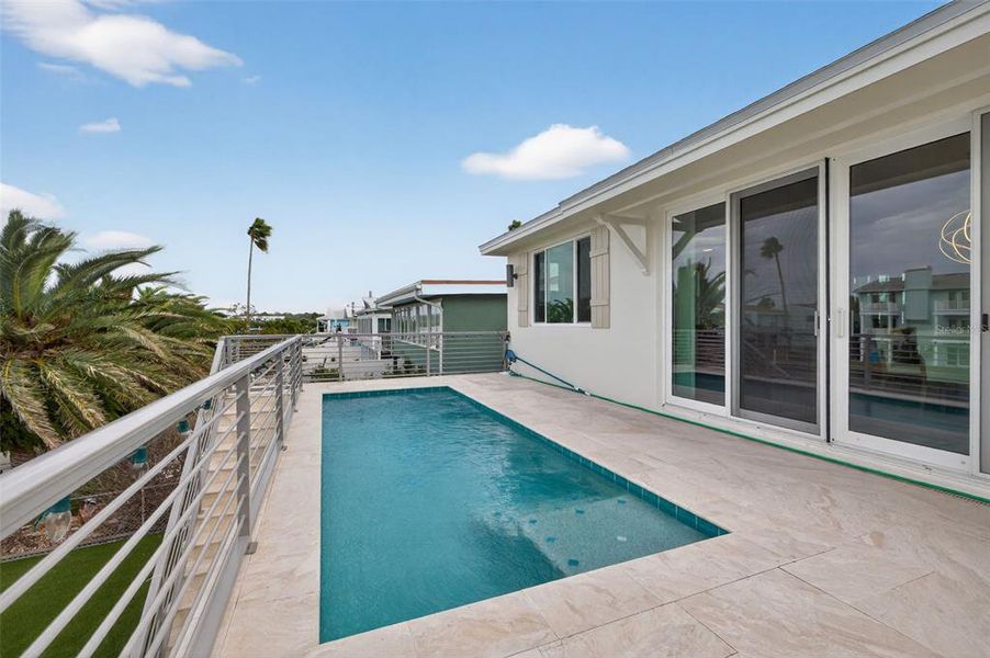 Exterior details and patio area of a home in , Indian Rocks Beach (Image 3).