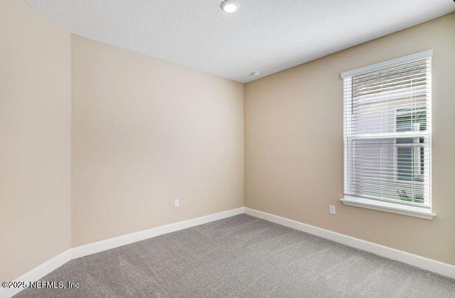 Spacious, unfurnished interior of a new home in Colbert Landings, Palm Coast (Image 9).