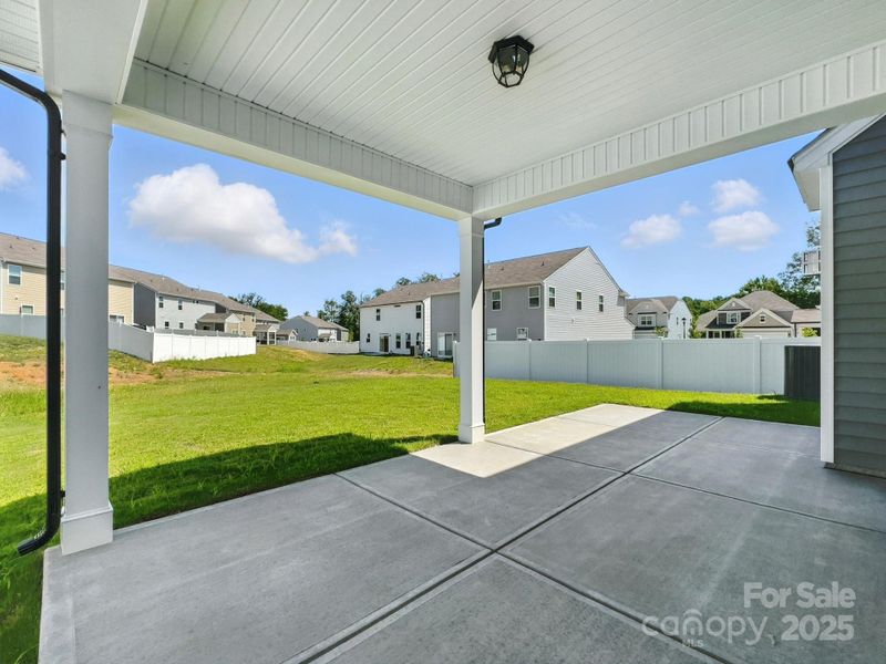 Front exterior of a new home in Hampton Woods, Charlotte, NC, highlighting curb appeal (Image 23).