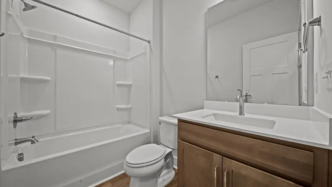 Memorable guest bath with refined tilework and a fresh, inviting feel