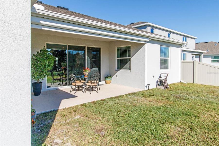 Exterior details and patio area of a home in Deerbrook, Land O' Lakes (Image 3). Exterior details and patio area of a home in Deerbrook, Land O' Lakes (Image 3).