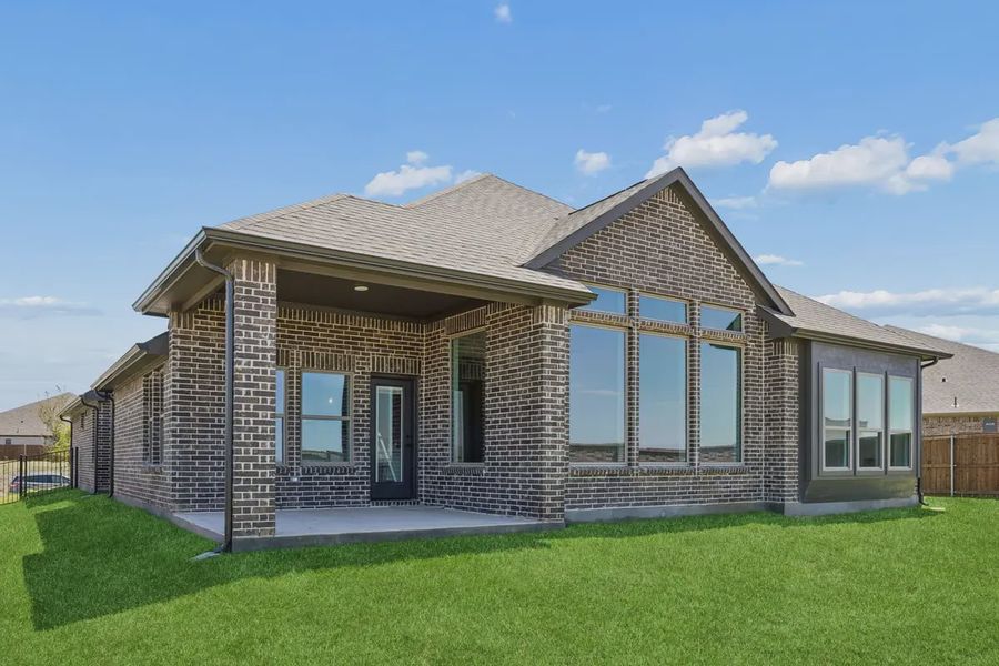 Exterior details and patio area of a home in Silo Mills, Joshua (Image 21).
