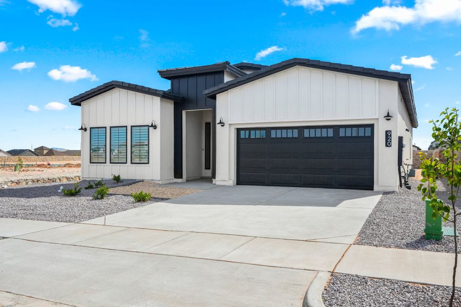 Front exterior of a new home in Painted Sky, El Paso, TX, highlighting curb appeal (Image 25).