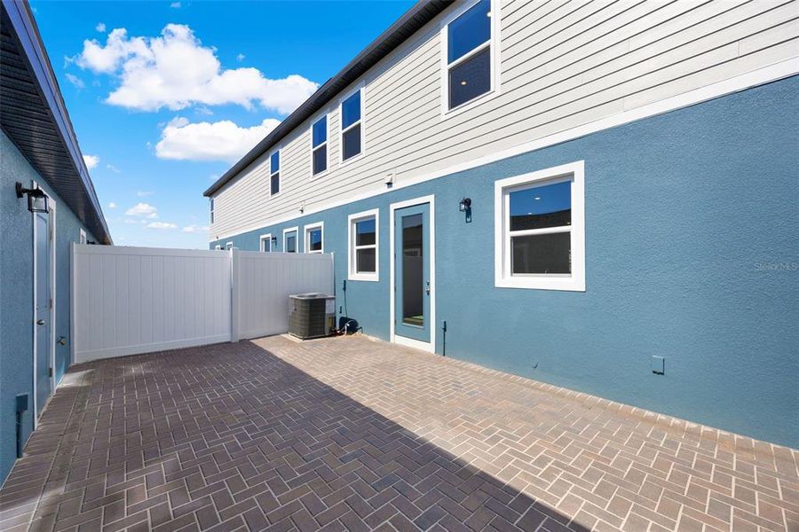 Front exterior of a new home in Eden Crest, Apopka, FL, highlighting curb appeal (Image 17).