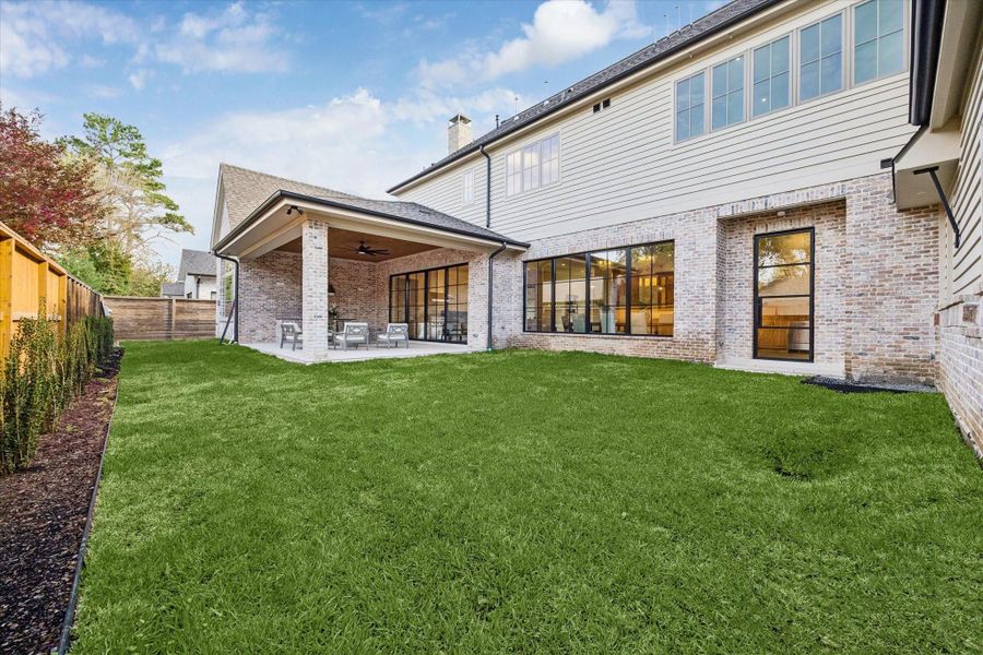 Exterior details and patio area of a home in , Spring Valley Village (Image 28).