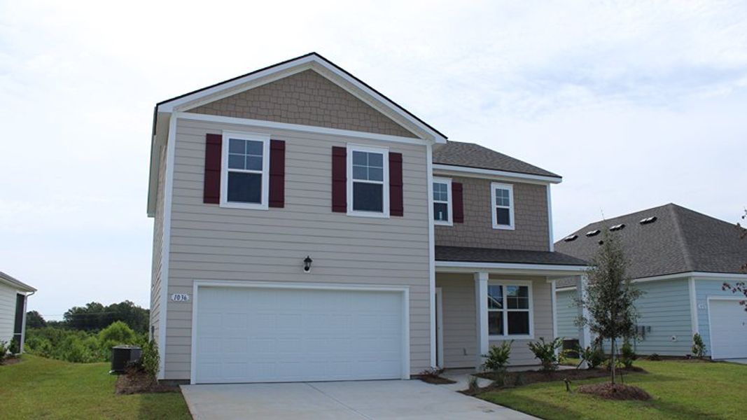 Representative exterior photo of a completed home built from the Plan by D.R. Horton in Hemingway Landing, Conway, SC (Image 2). Representative exterior photo of a completed home built from the Plan by D.R. Horton in Hemingway Landing, Conway, SC (Image 2).