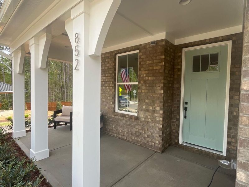 Exterior details and patio area of a home in Sage on North Main, Wake Forest (Image 3).
