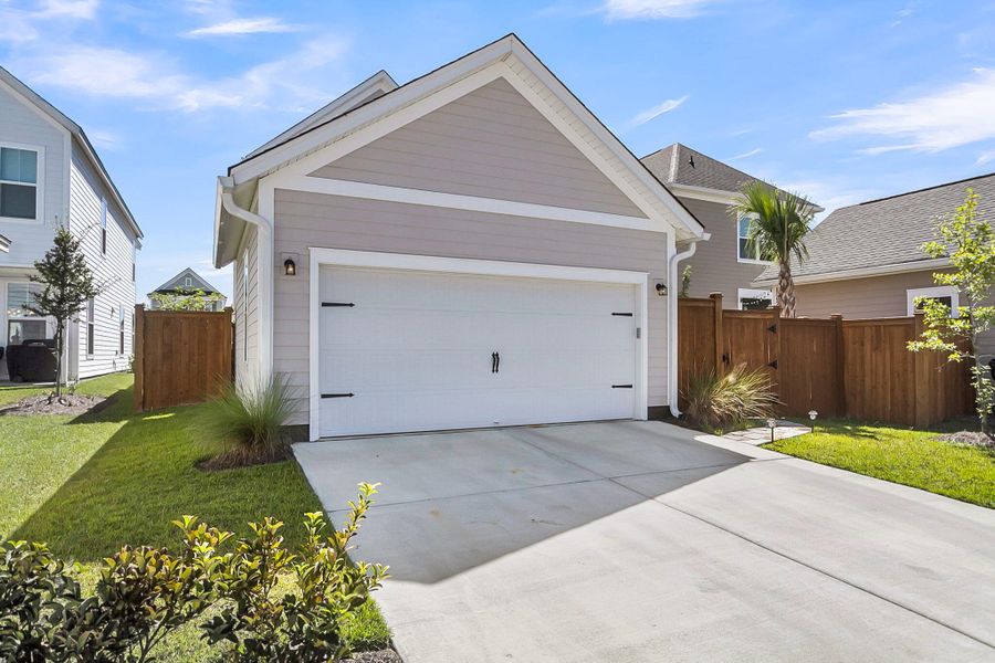 Front exterior of a new home in Midtown at Nexton, Summerville, SC, highlighting curb appeal (Image 22).